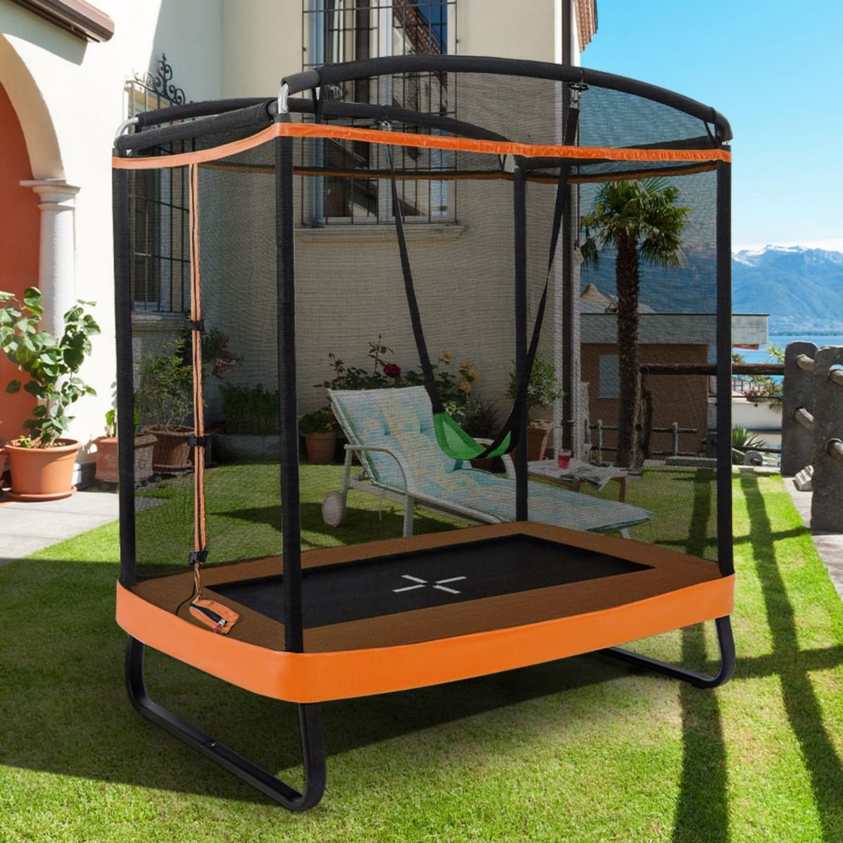 Coast 2-in-1 Kindertrampolin mit Schaukel und Sicherheitsnetz - Schwarz/Orange - 190x122 cm
