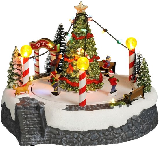 Luville Weihnachtsdorf: Weihnachtsbaum-Szene mit Eislaufbahn – Weihnachtsdekoration mit beweglichen Figuren und LED-Beleuchtung – batteriebetriebene Girlande – Weihnachtsgirlanden für den Innenbereich – 22 x 22 x 18,5 cm – Weiß