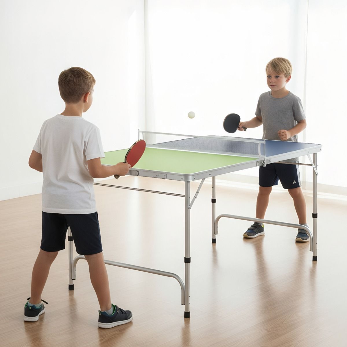 Coast Mini-Tischtennisplatte – Zusammenklappbar – Höhenverstellbar – 120 x 76 cm – Grün, Blau, Silber