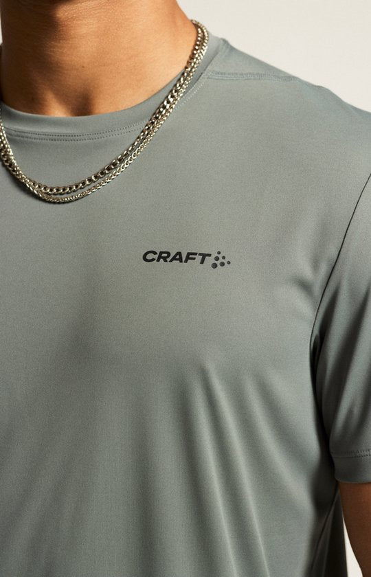 CRAFT CORE ESSENCE SS TEE 2 M Herren Sporthemd - LEAF