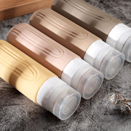 EverNeeds Reiseflaschen mit Etui - Nachfüllbar - Silikon-Reiseflaschen Handgepäck - Hell Apricot - 4 Stück