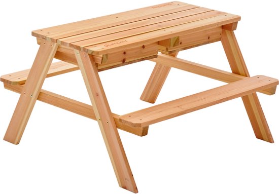 Plum Surfside Sand, Wasser und Picknicktisch