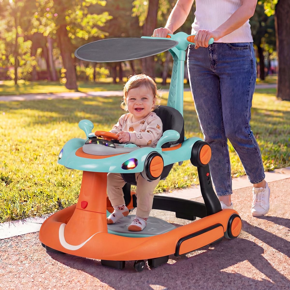 Coast 7-in-1-Lauflernwagen – höhen- und geschwindigkeitsverstellbar – mit Musik und Licht – orange