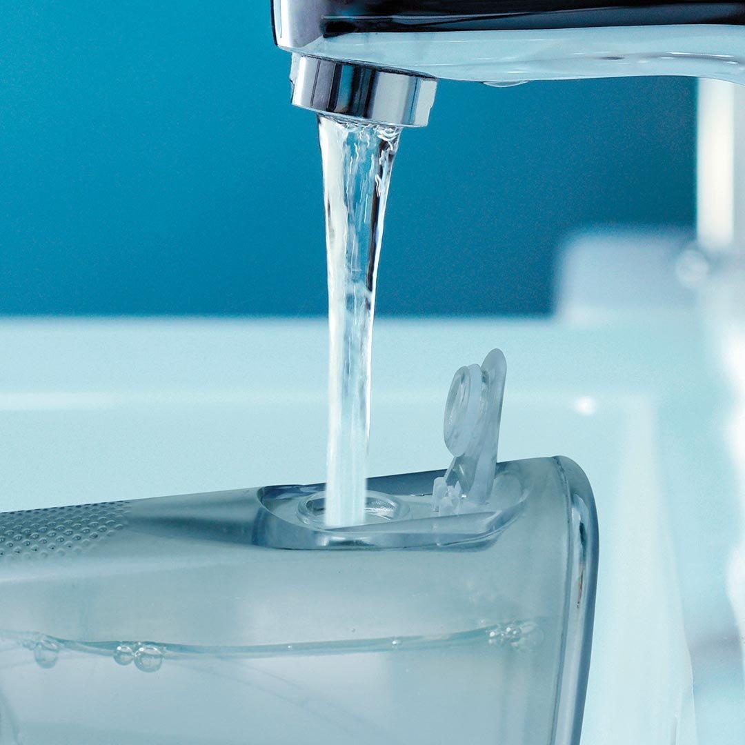 CorpCare MiracleSmile elektrische Munddusche – H-förmiger Aufsatz – Kabelloses Design – Praktischer Wassertank